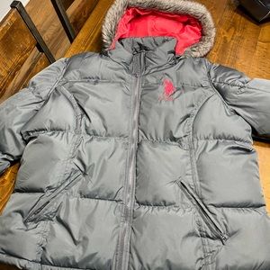 Womens winter coat with faux fir trimmed hood.